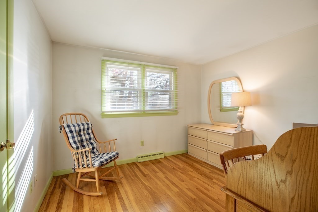 1 Spring Lane Sharon, MA 02067 - Photo 9 of 23 a bedroom with a bed and a chair