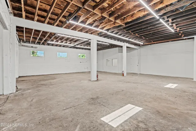 an aerial view of a house with a garden