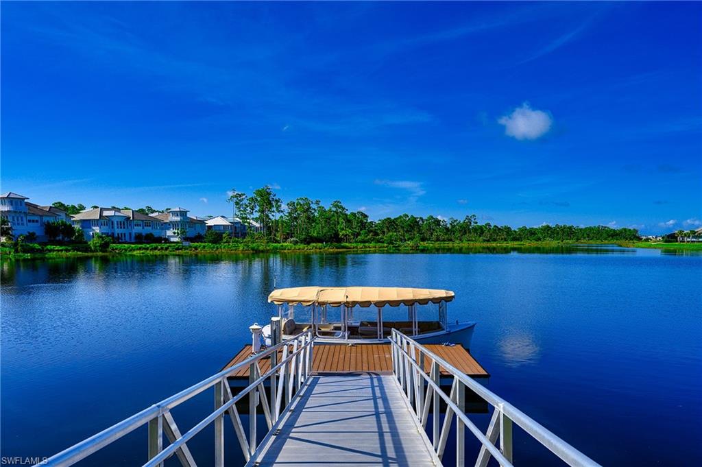 6809 Bequia Way Naples, FL 34113 - Photo 41 of 46 Dock area with a water view