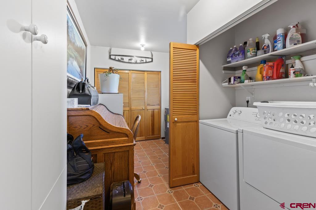 15567 6282nd Road Montrose, CO 81403 - Photo 18 of 36 a room with storage and utility