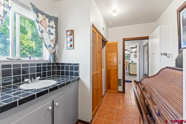 a view of a garage with parked cars