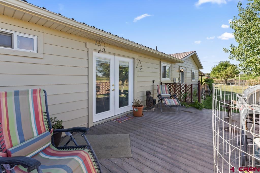 15567 6282nd Road Montrose, CO 81403 - Photo 21 of 36 a view of a chairs with a patio
