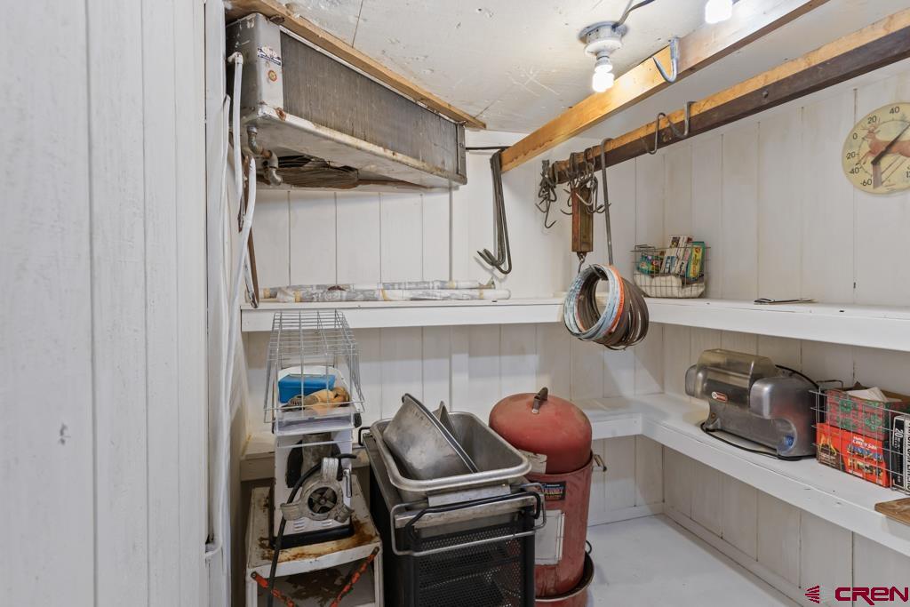 15567 6282nd Road Montrose, CO 81403 - Photo 35 of 36 a kitchen with stainless steel appliances granite countertop a sink and cabinets