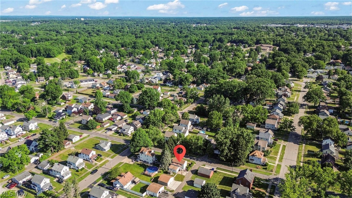 629 Clinton Street Niles, OH 44446 - Photo 12 of 50 Aerial perspective showcasing a residential neighborhood with a dense tree canopy