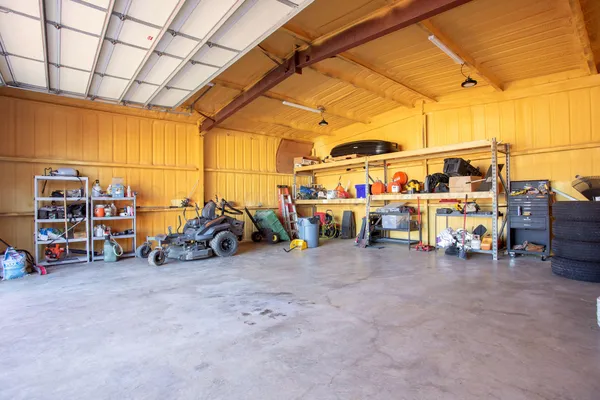 a view of a garage with cars
