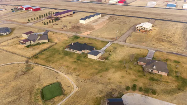 a front view of a house with swimming pool