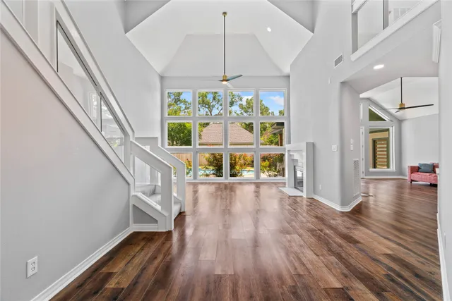 a view of an entryway with wooden floor