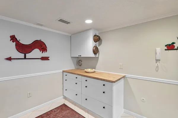 a kitchen with a sink and a stove