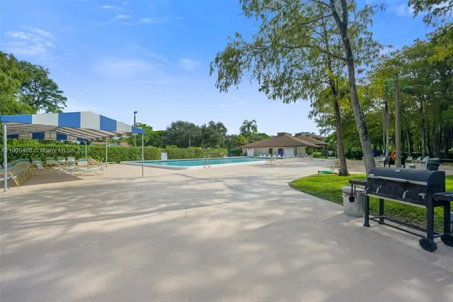 a view of a back yard of the house