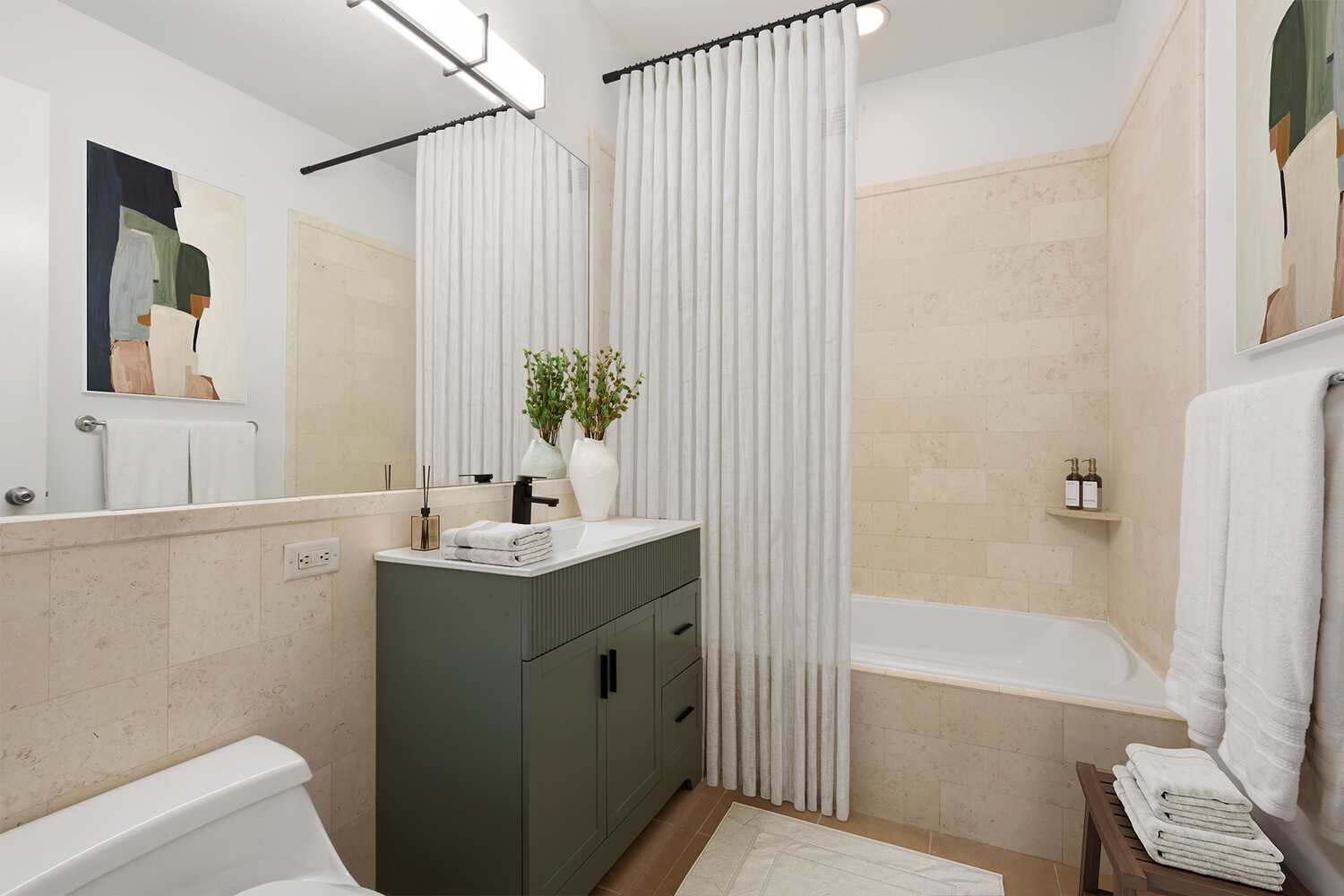 252 7th Avenue, Unit 7K Manhattan, NY 10001 - Photo 5 of 6 a bathroom with a granite countertop sink a toilet and shower