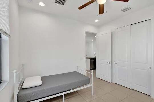 a room with a table and chandelier