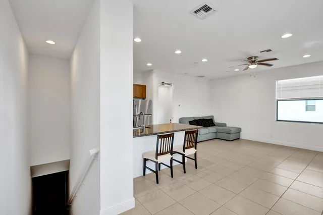 a view of a workspace with furniture