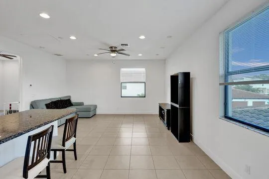 a view of workspace with furniture and window