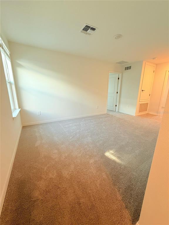 17602 Pleasantview Boulevard Land O Lakes, FL 34638 - Photo 11 of 27 a view of a big room with closet