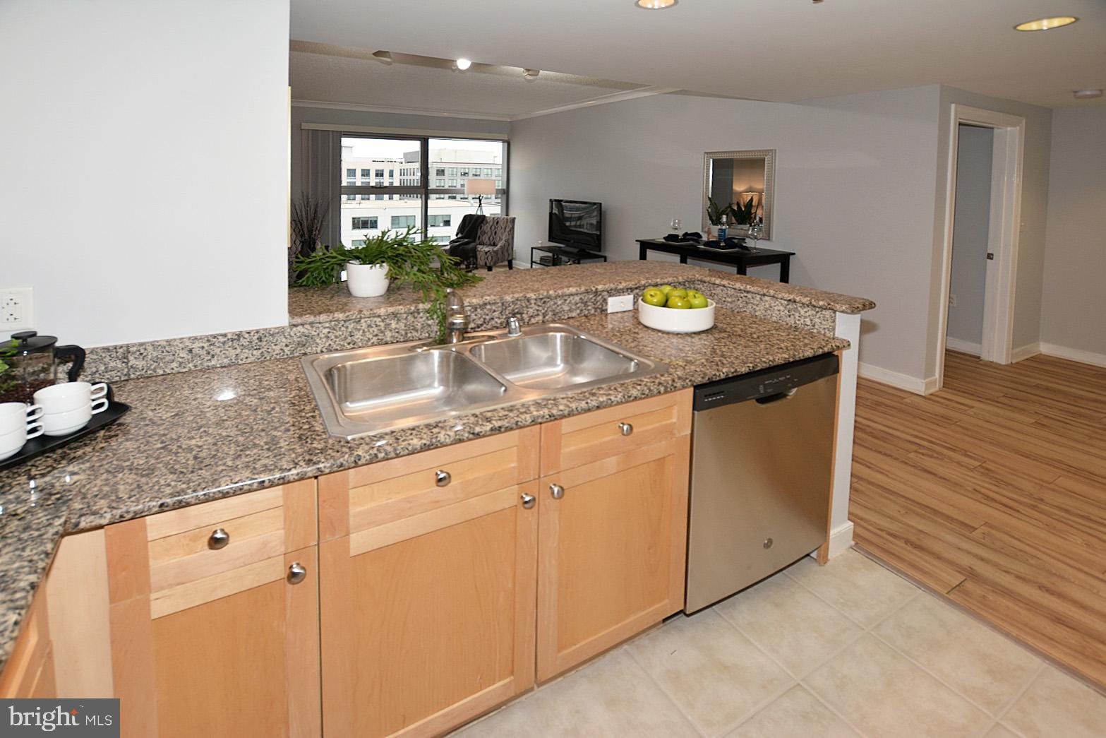 777 7th Street Northwest, Unit 1014 Washington, DC 20001 - Photo 21 of 43 a kitchen with sink and window