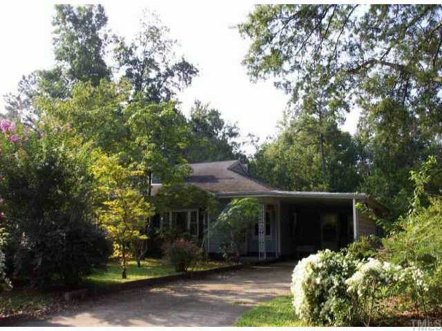 719 Grovemont Road Raleigh, NC 27603 - Photo 1 of 1 front view of a house with a yard
