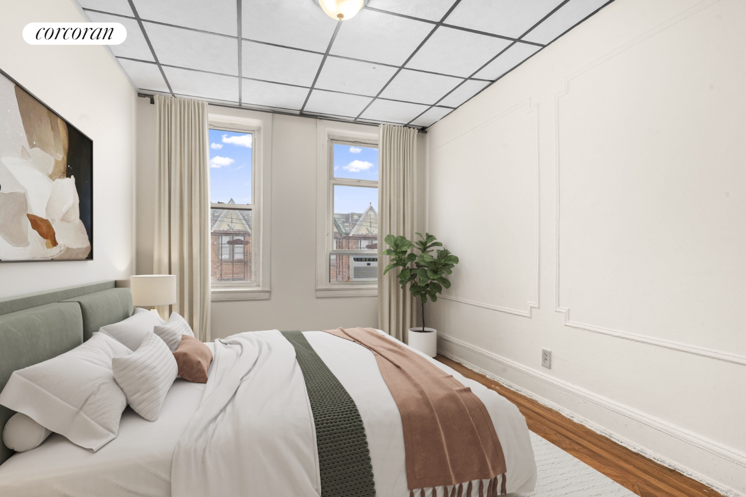 845 Bay Ridge Avenue Brooklyn, NY 11220 - Photo 4 of 7 a bedroom with a bed and a potted plant