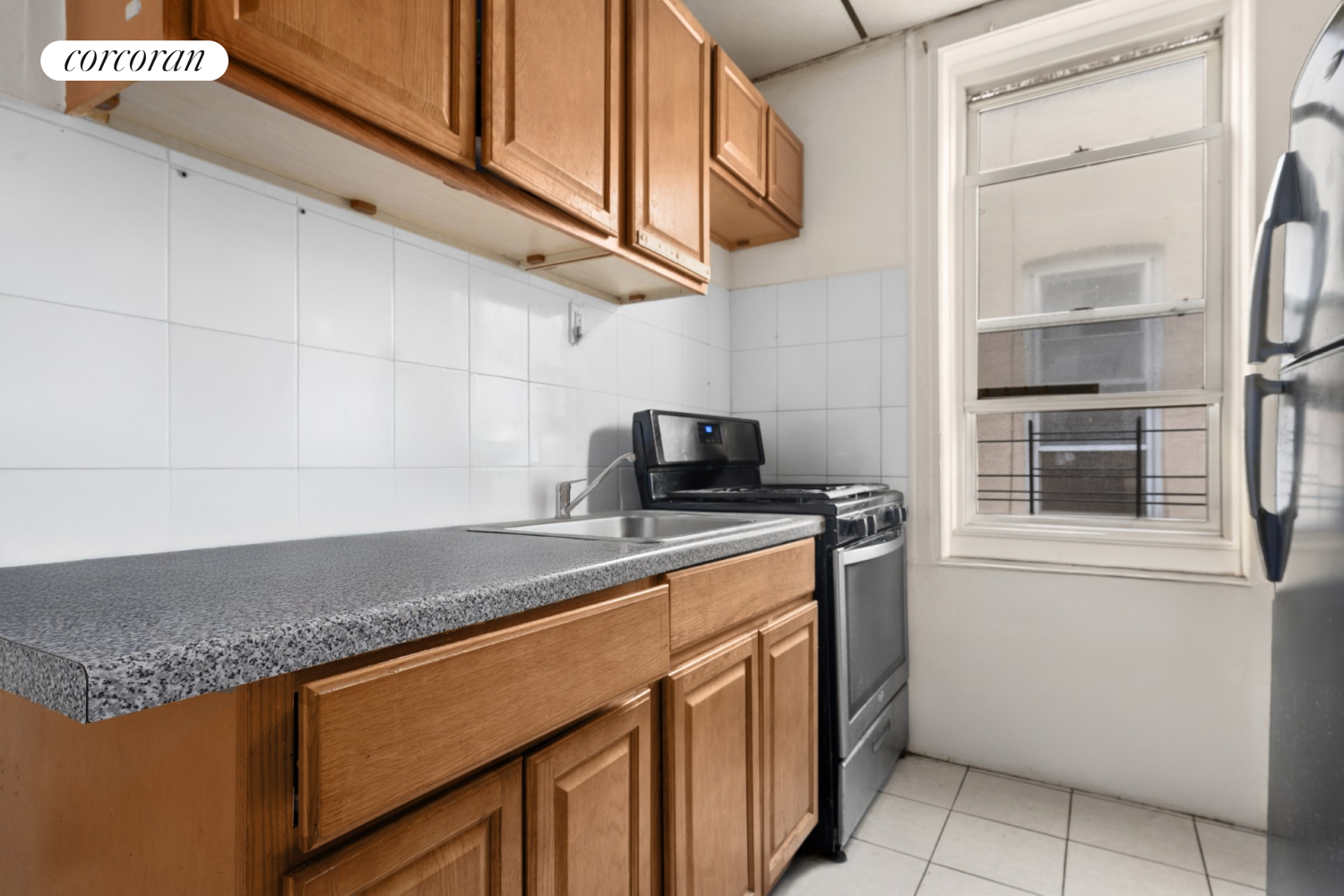 845 Bay Ridge Avenue Brooklyn, NY 11220 - Photo 5 of 7 a kitchen with stainless steel appliances granite countertop a sink and dishwasher