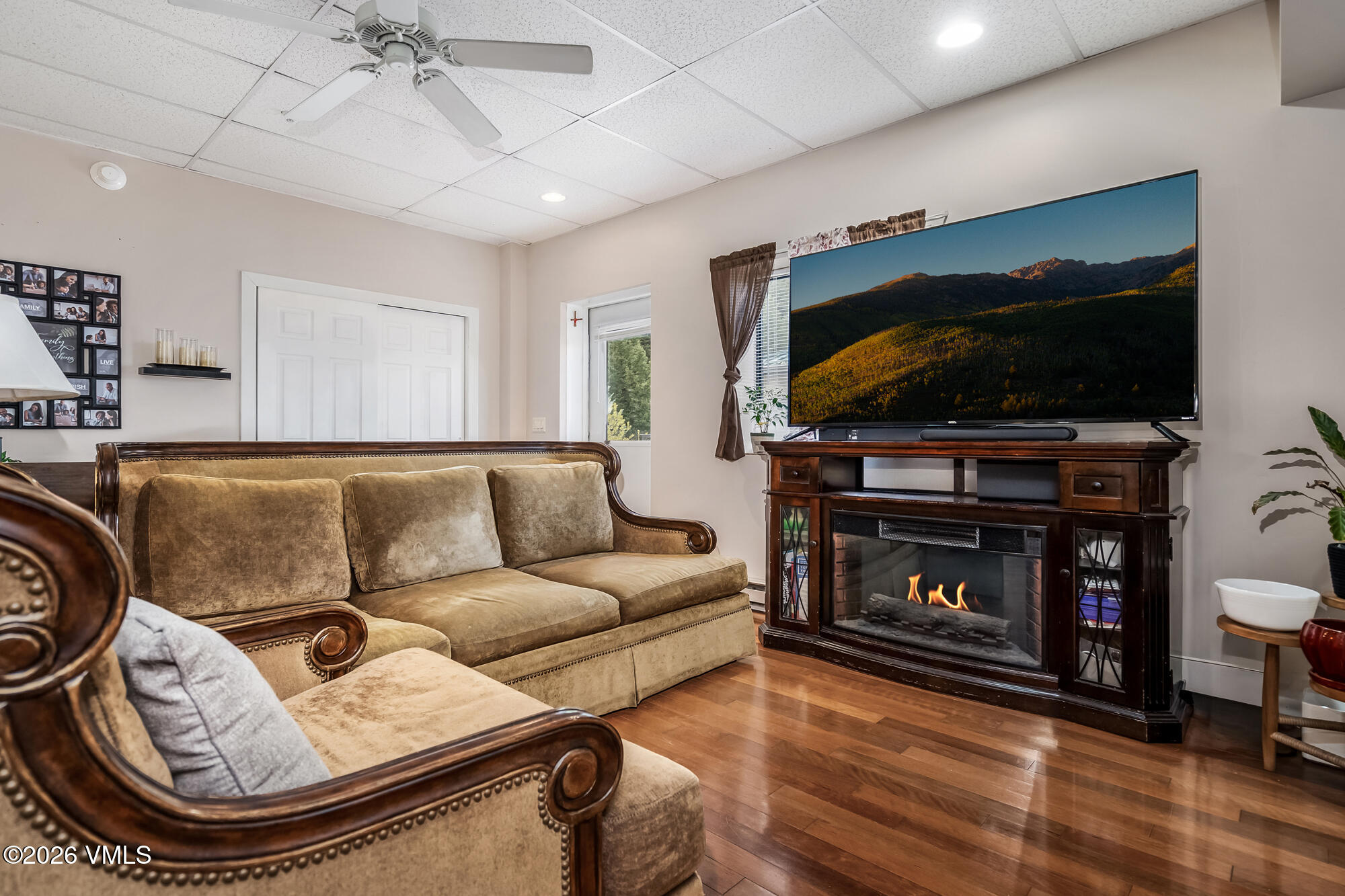 5 Murray Road, Unit B4 Edwards, CO 81632 - Photo 20 of 28 a living room with furniture a flat screen tv and a fireplace