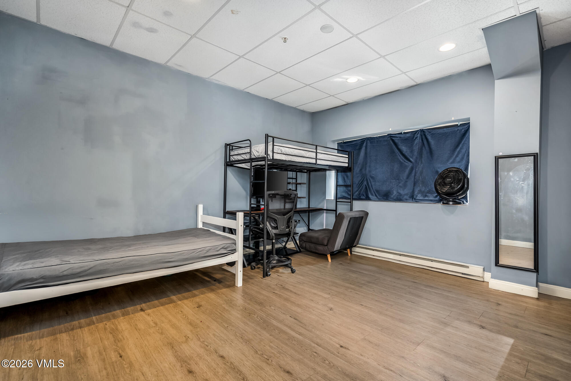 5 Murray Road, Unit B4 Edwards, CO 81632 - Photo 24 of 28 a bedroom with furniture and a wooden floor