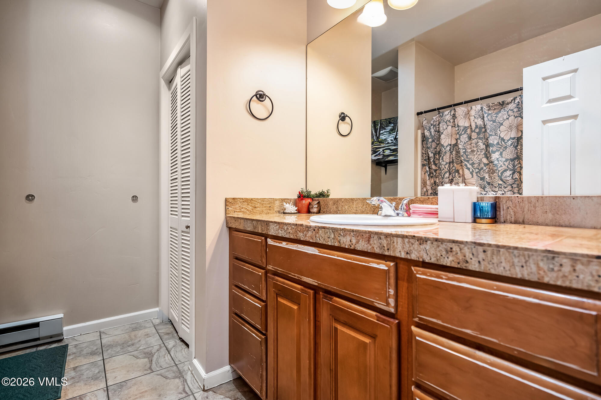 5 Murray Road, Unit B4 Edwards, CO 81632 - Photo 25 of 28 a bathroom with a sink and a mirror