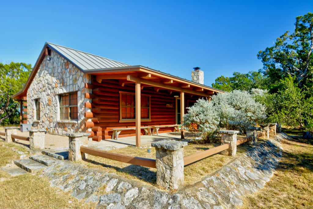 191 Coultress Road Kerrville, TX 78028 - Photo 1 of 3 front view of a house with a patio