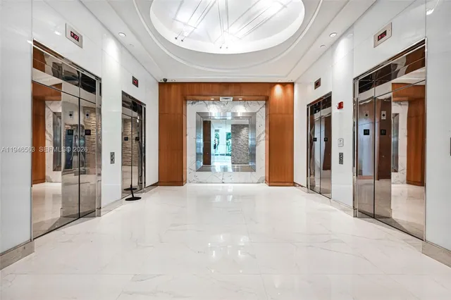 a view of an entryway with a livingroom