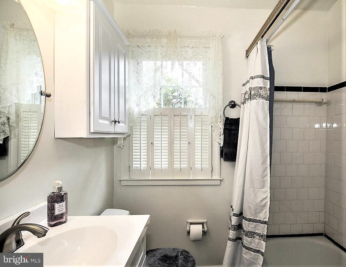 8301 Hillendale Road Baltimore, MD 21234 - Photo 6 of 8 UPPER LEVEL FULL BATH w/BONUS END UNIT WINDOW