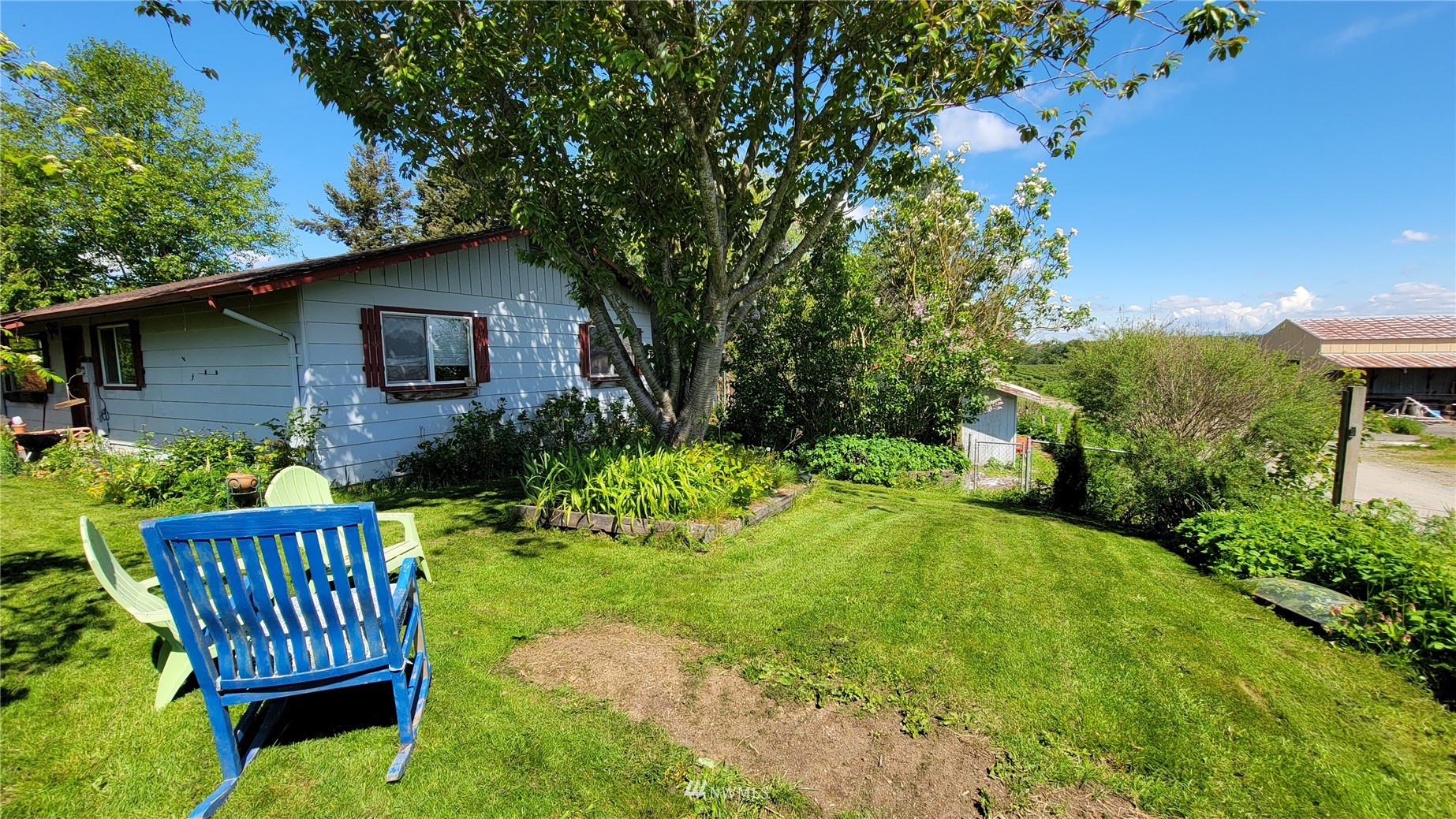 1224 Mission Road Everson, WA 98247 - Photo 1 of 30 a view of a chair in backyard of house