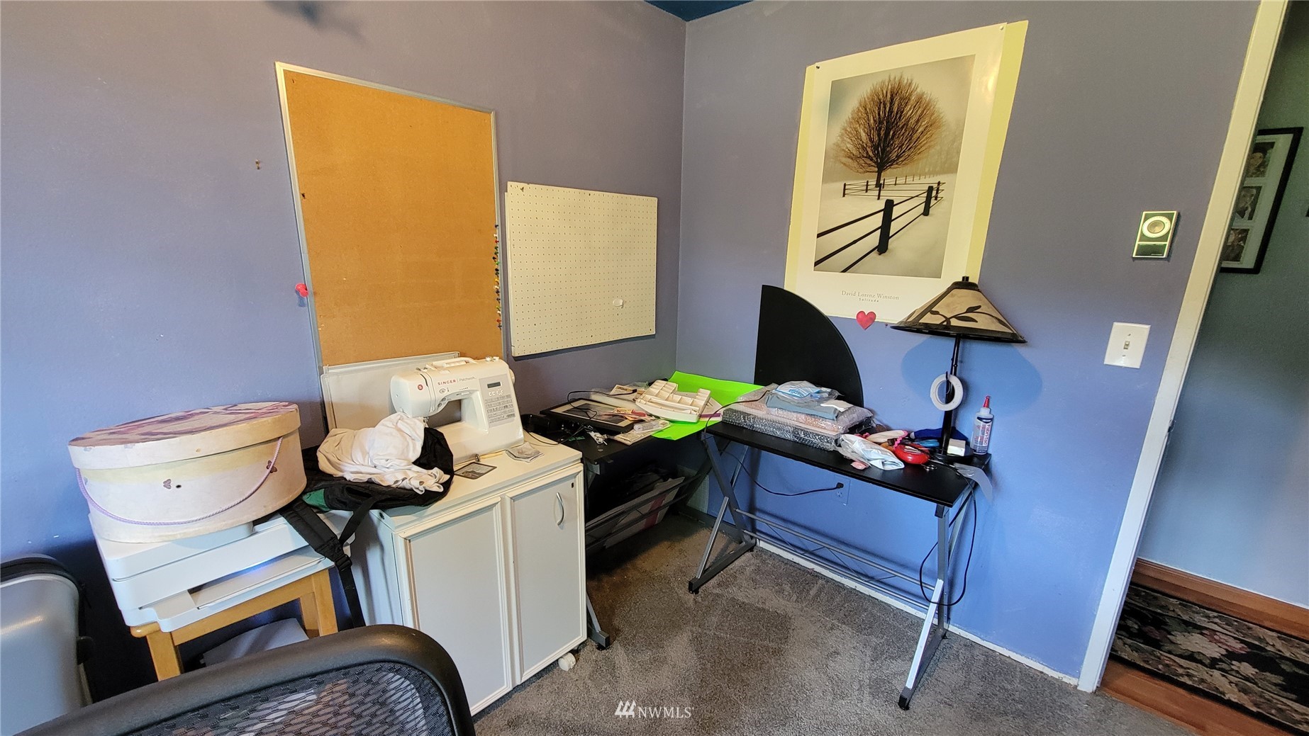 1224 Mission Road Everson, WA 98247 - Photo 17 of 30 a living room with a couch and a dresser next to a window