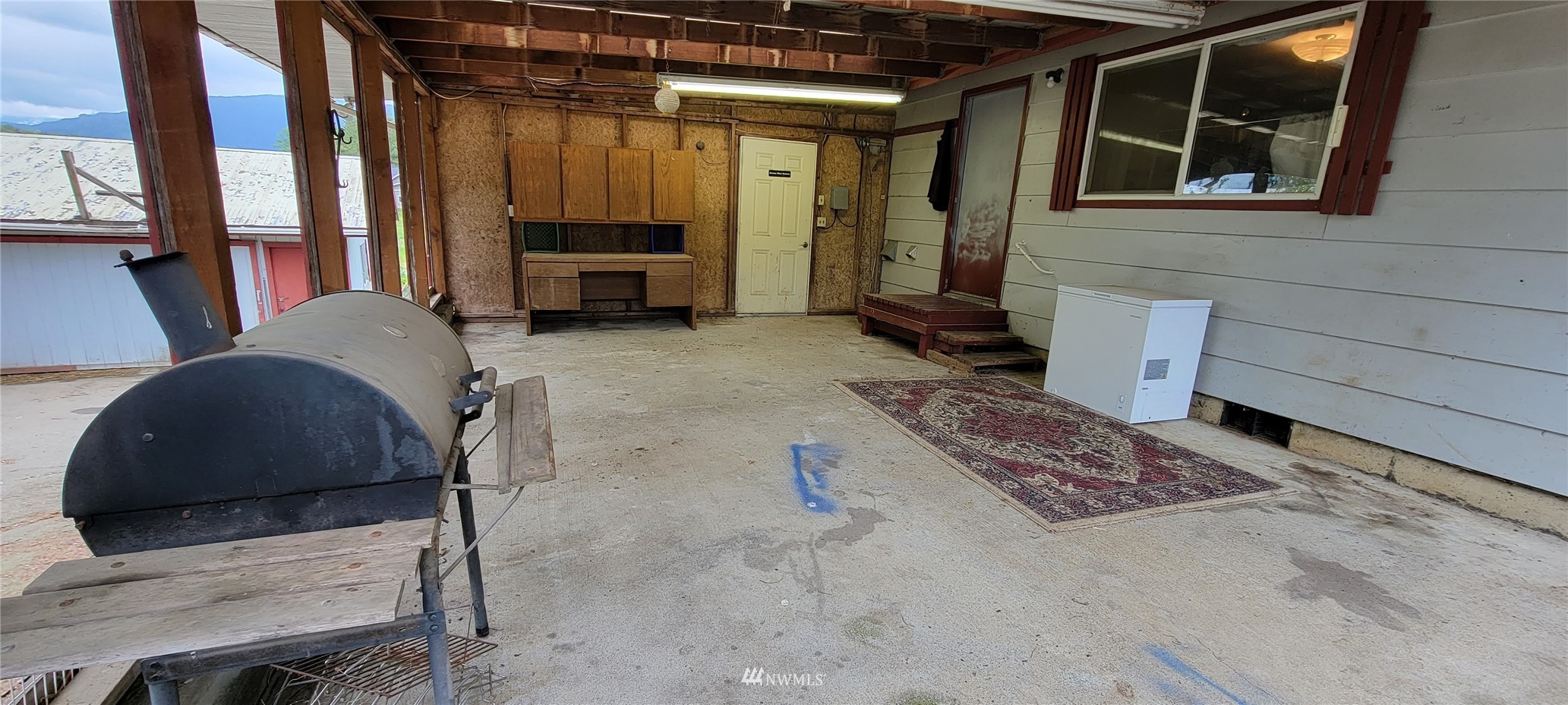 1224 Mission Road Everson, WA 98247 - Photo 27 of 30 a living room with furniture and a window