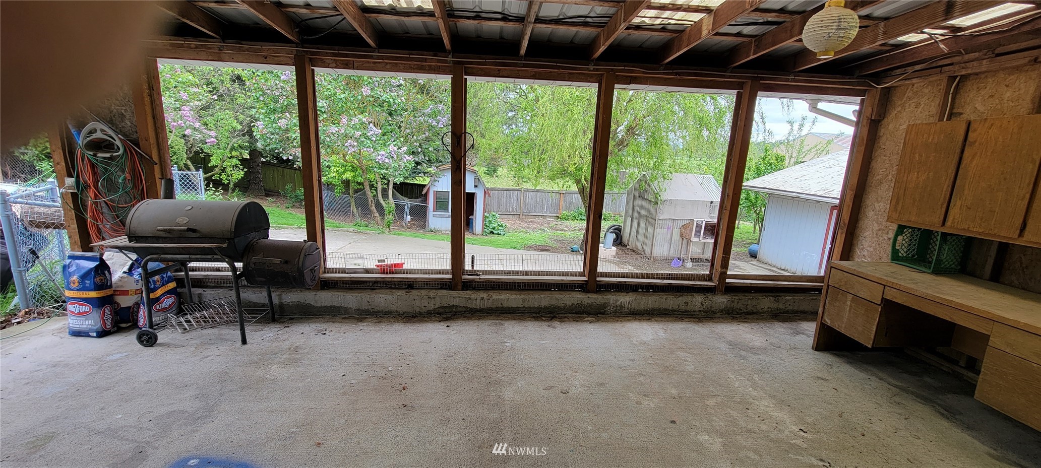 1224 Mission Road Everson, WA 98247 - Photo 28 of 30 a view of gym equipment with a floor to ceiling window
