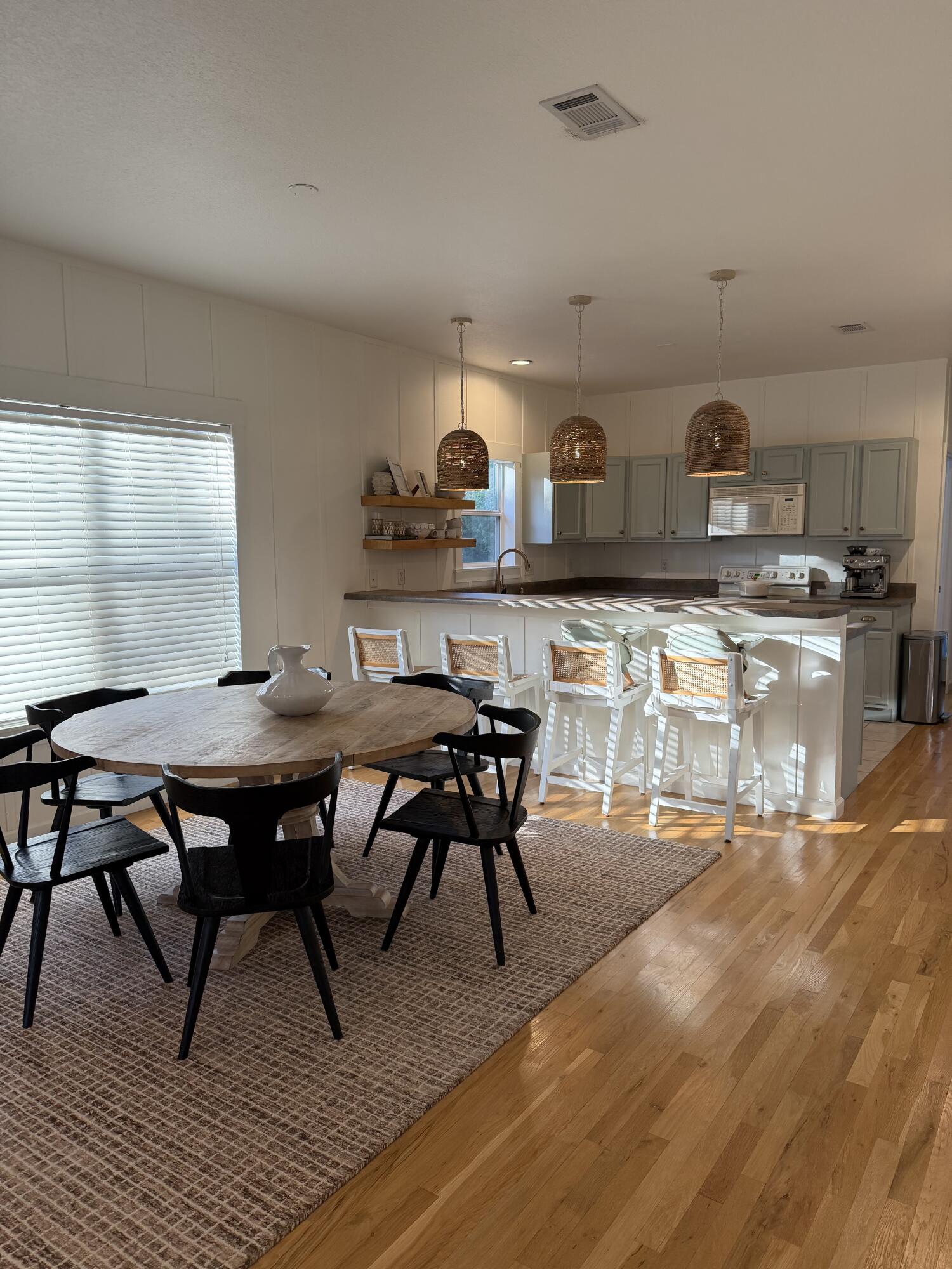 176 Georgie Street Santa Rosa Beach, FL 32459 - Photo 11 of 31 a view of a dining room with furniture and window