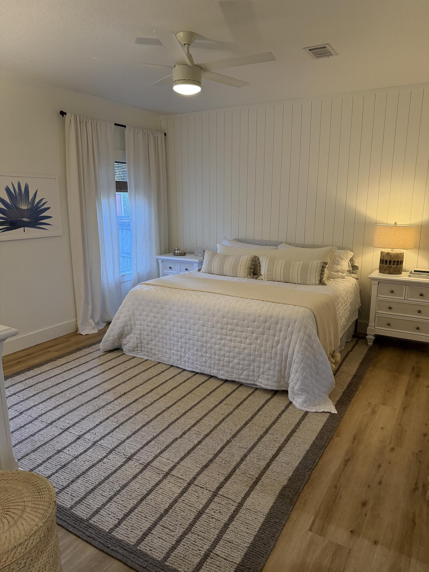 176 Georgie Street Santa Rosa Beach, FL 32459 - Photo 15 of 31 a bedroom with a bed and a night stand