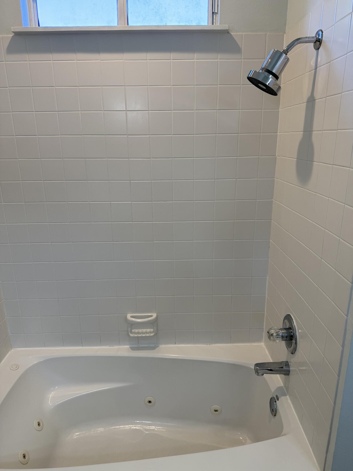 176 Georgie Street Santa Rosa Beach, FL 32459 - Photo 19 of 31 a bathroom with a bathtub