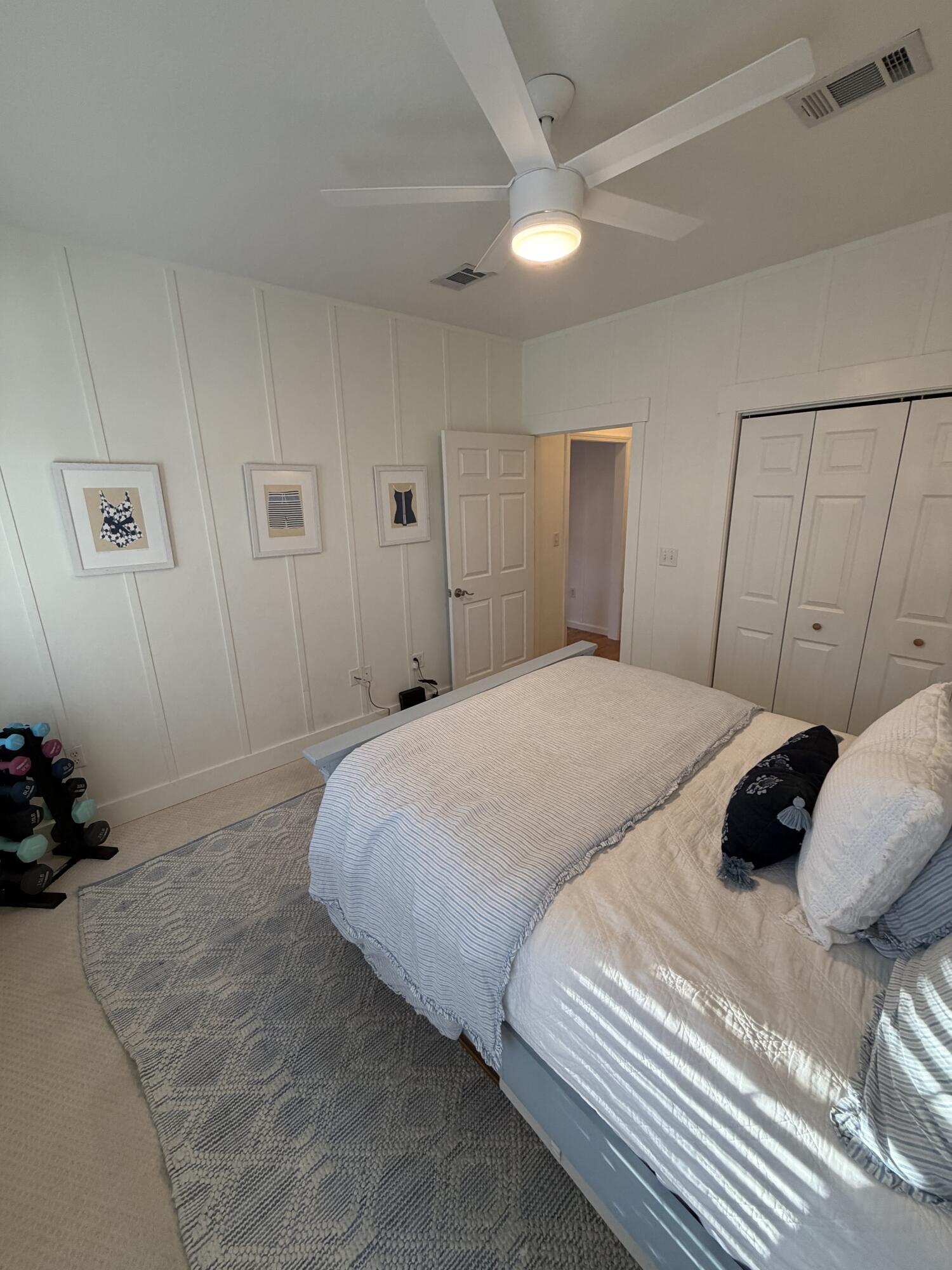 176 Georgie Street Santa Rosa Beach, FL 32459 - Photo 21 of 31 a bedroom with a bed and a ceiling fan