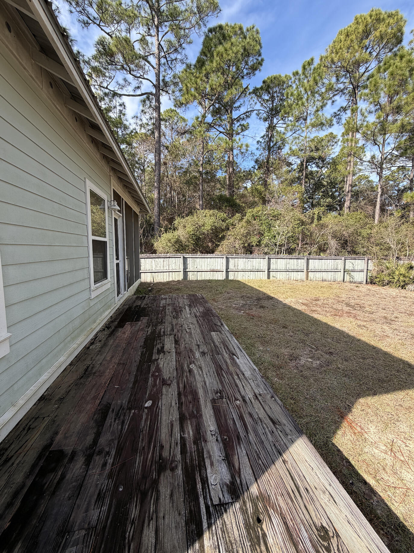 176 Georgie Street Santa Rosa Beach, FL 32459 - Photo 30 of 31 a view of a backyard of the house