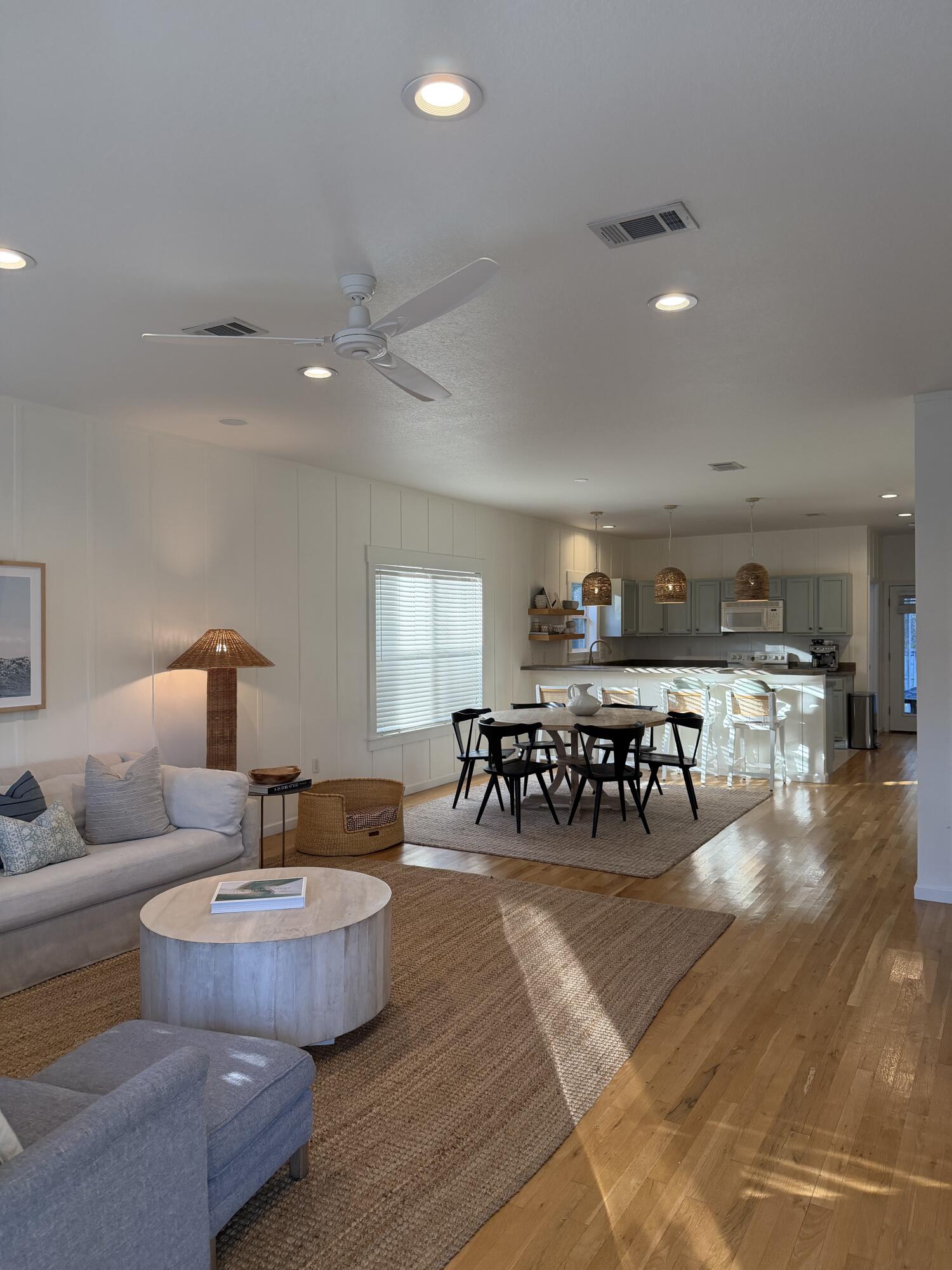 176 Georgie Street Santa Rosa Beach, FL 32459 - Photo 7 of 31 a living room with furniture and wooden floor