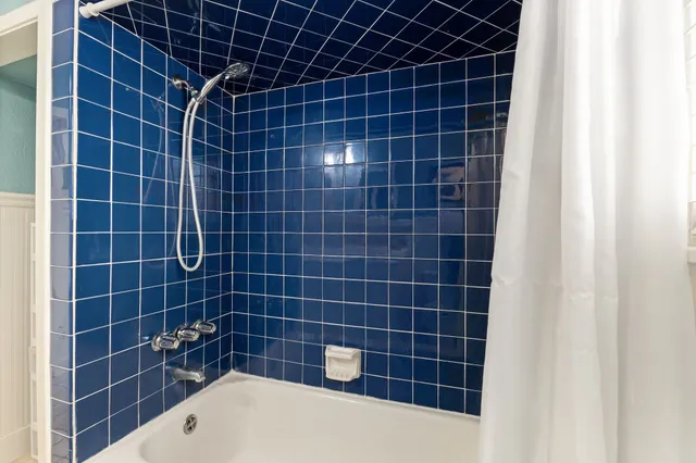 a bathroom with a blue sink