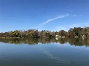 a view of lake with boats