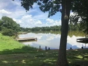 a view of a lake with outdoor space