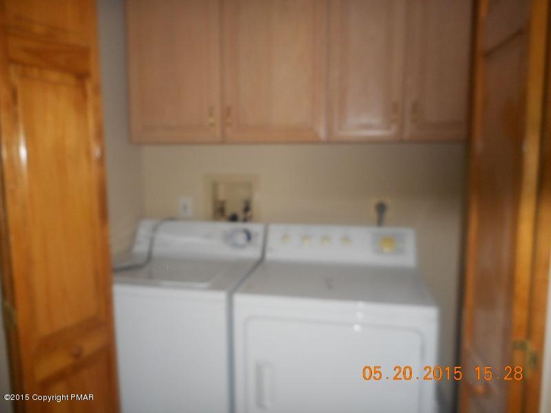 413 Devils Hole Road Cresco, PA 18326 - Photo 12 of 15 a utility room with dryer and washer