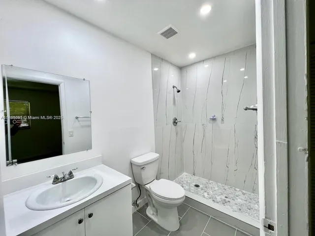 a view of a building with a window and balcony