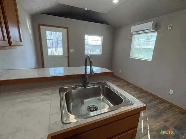 a close view of sink and mirror