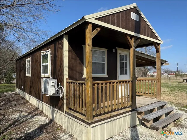 a front view of a house with balcony