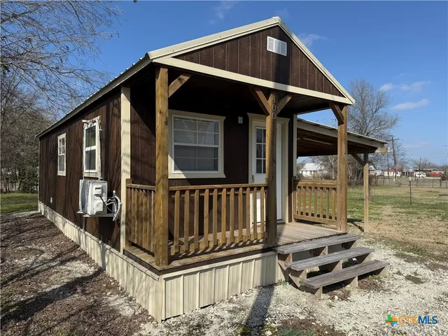 a front view of a house with balcony