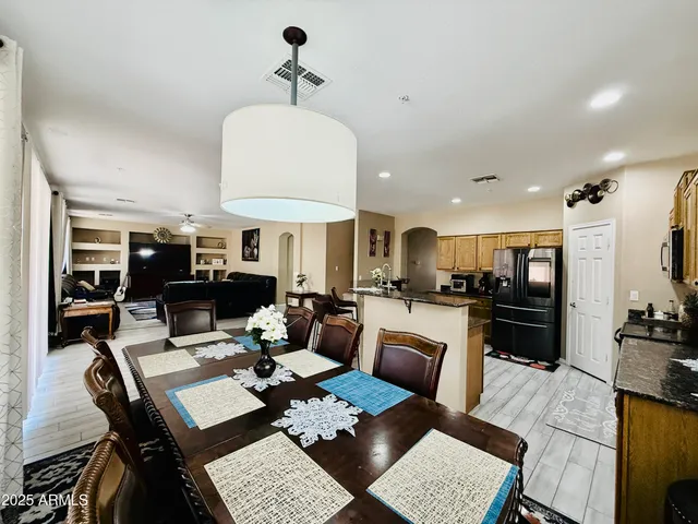 a view of a dining room with furniture