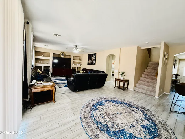 a living room with furniture and a couch
