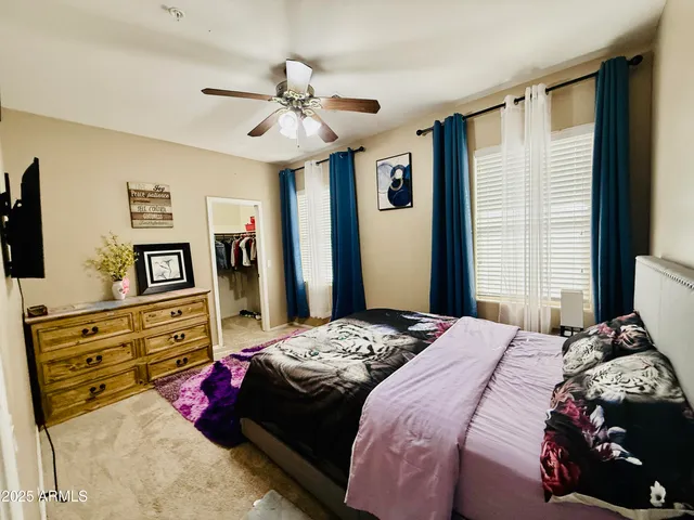 a living room with a couch and a wooden floor