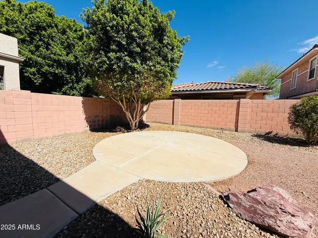a view of multiple houses with a yard